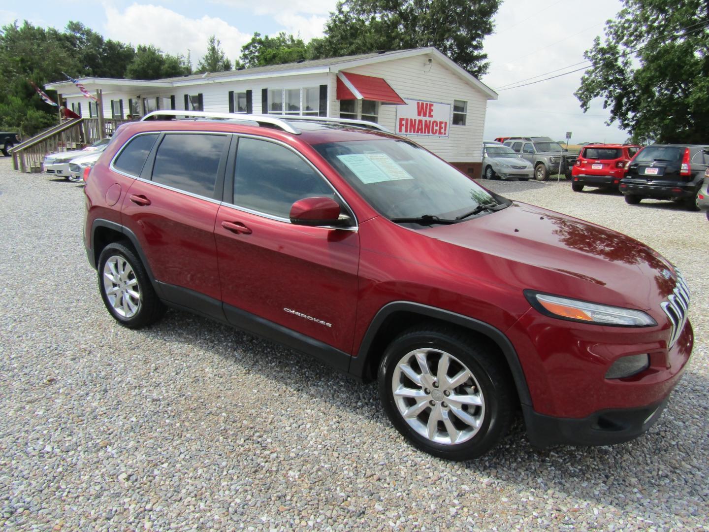 2014 Red /Black Jeep Cherokee Limited FWD (1C4PJLDS1EW) with an 3.2L V6 DOHC 24V engine, Automatic transmission, located at 15016 S Hwy 231, Midland City, AL, 36350, (334) 983-3001, 31.306210, -85.495277 - Photo#0